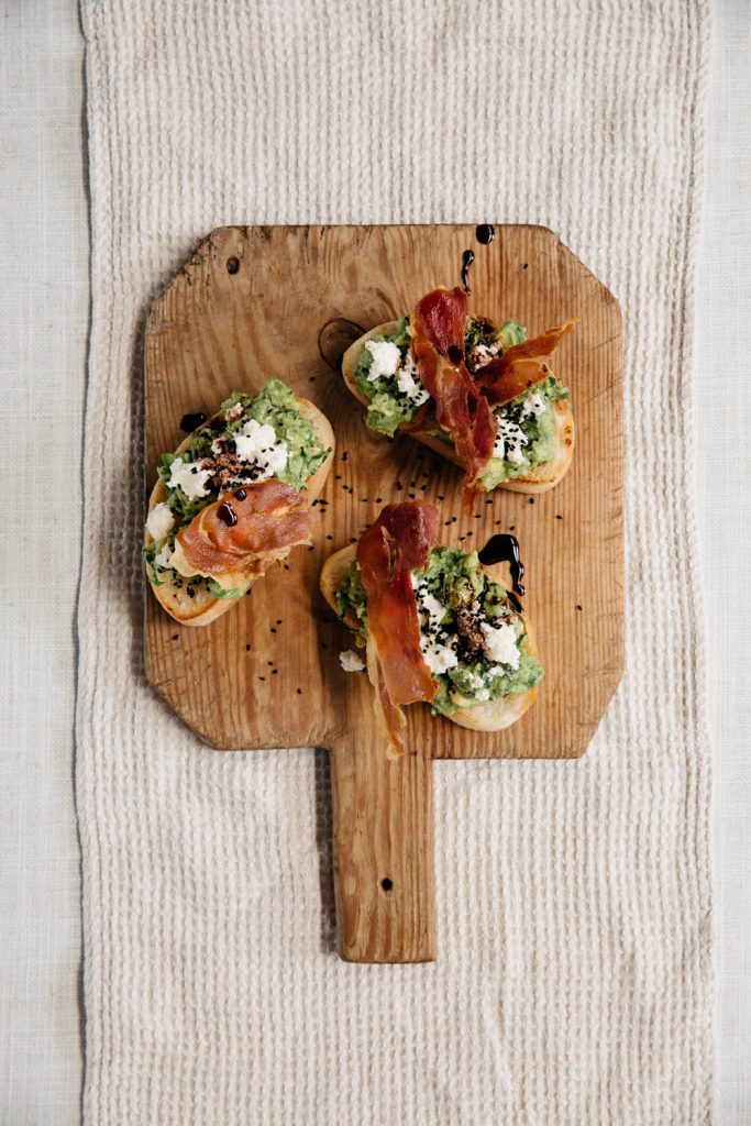 Smashed avo on sourdough with pesto and cumin seeds – Avowest Avocados